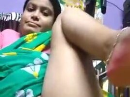 Pretty Indian teen demonstrates hairy muff on camera