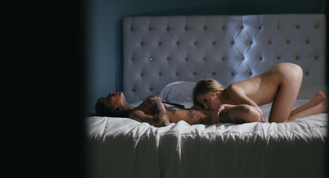 Brunette with tattoos has lesbian sex in the bedroom