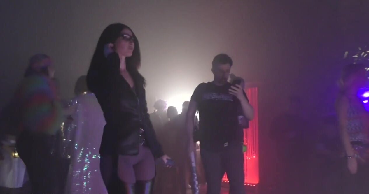 Kinky gal flashes bare pussy and tits in the nightclub