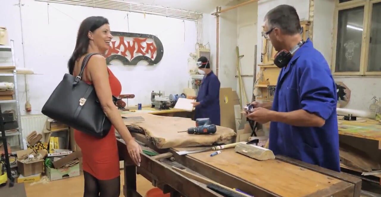 Hot MILF gets fucked by two carpenters at the workshop
