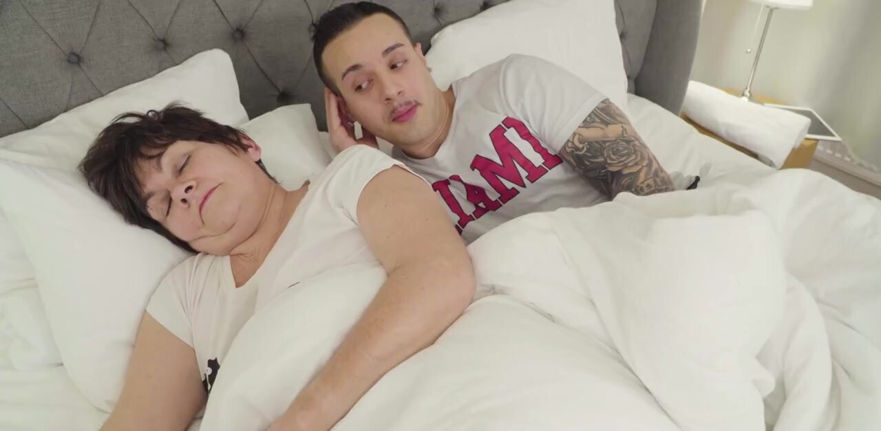Hung boy shares bed with busty mother-in-law