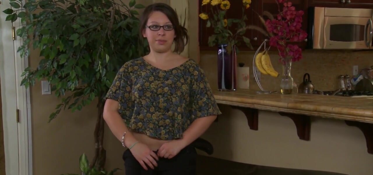 Nerdy housewife rubs hairy pussy in the kitchen