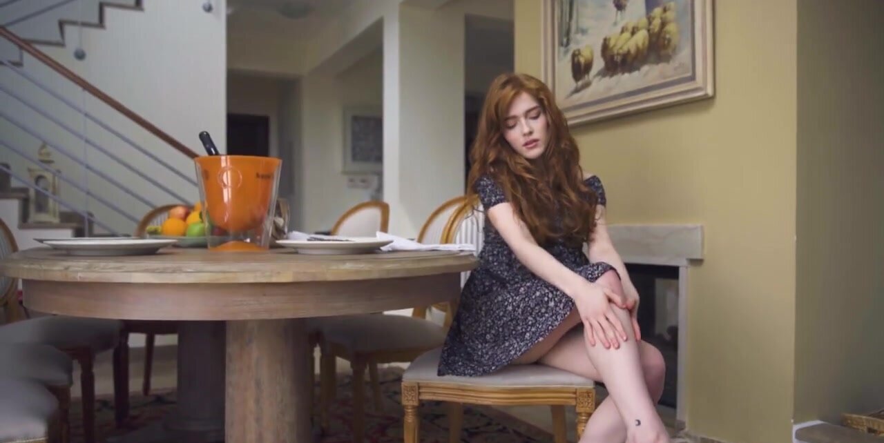Adorable redhead decides to masturbate in the kichen