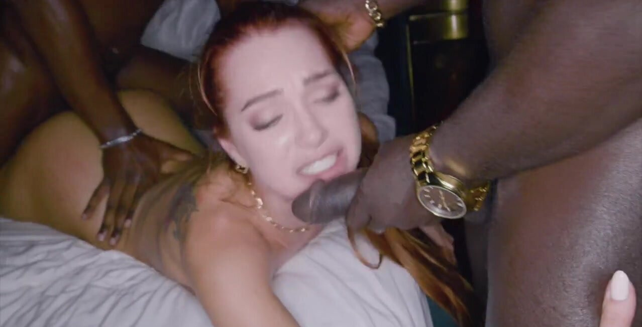 Taboo movie showing a red haired baddie taking two dicks