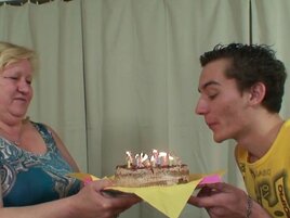 Skinny European dude is getting a blowjob from a GILF
