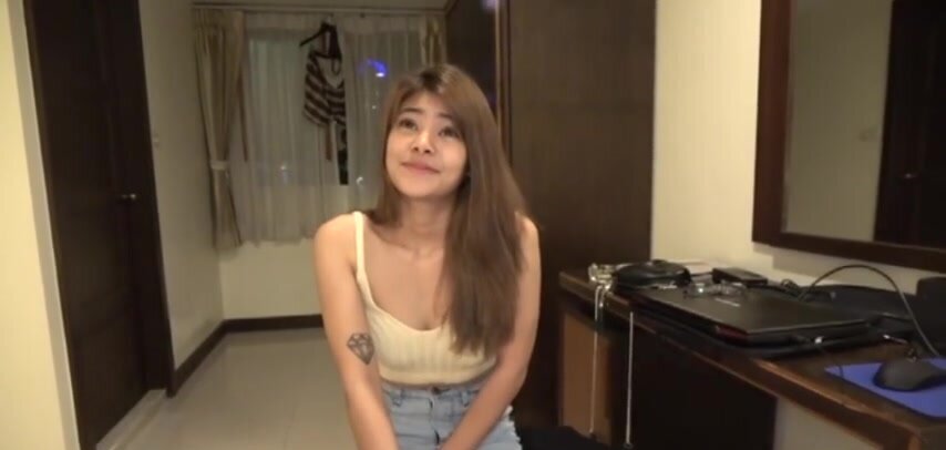 Brace faced Thai girl looks happy to see a BWC for her