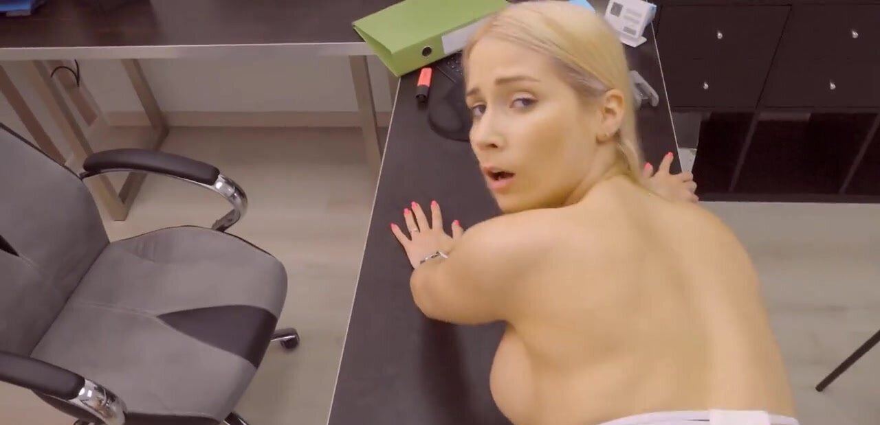 Nailing the blonde woman on the desk for the loan