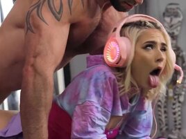 Jessie Saint playing video games while Danny Steele bangs her