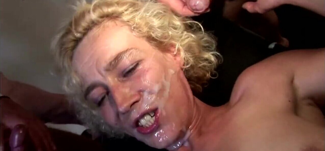 German whore Steffi Blonde is covered in semen at the orgy