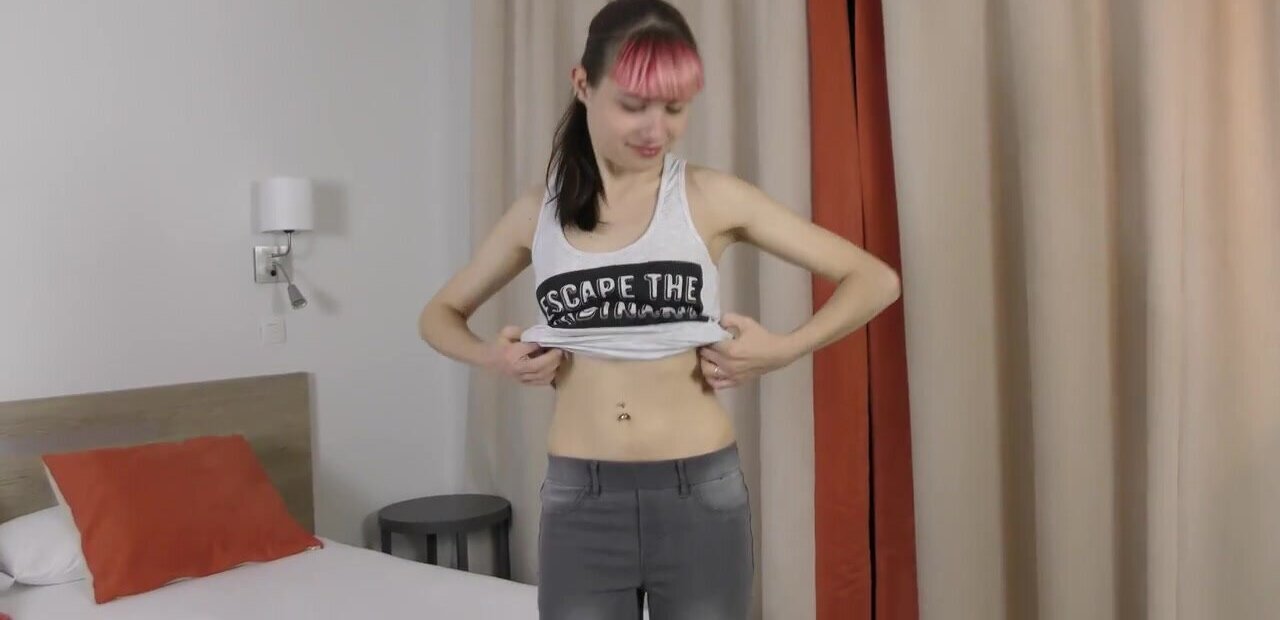 Redheaded teen with a slender body having her first porn