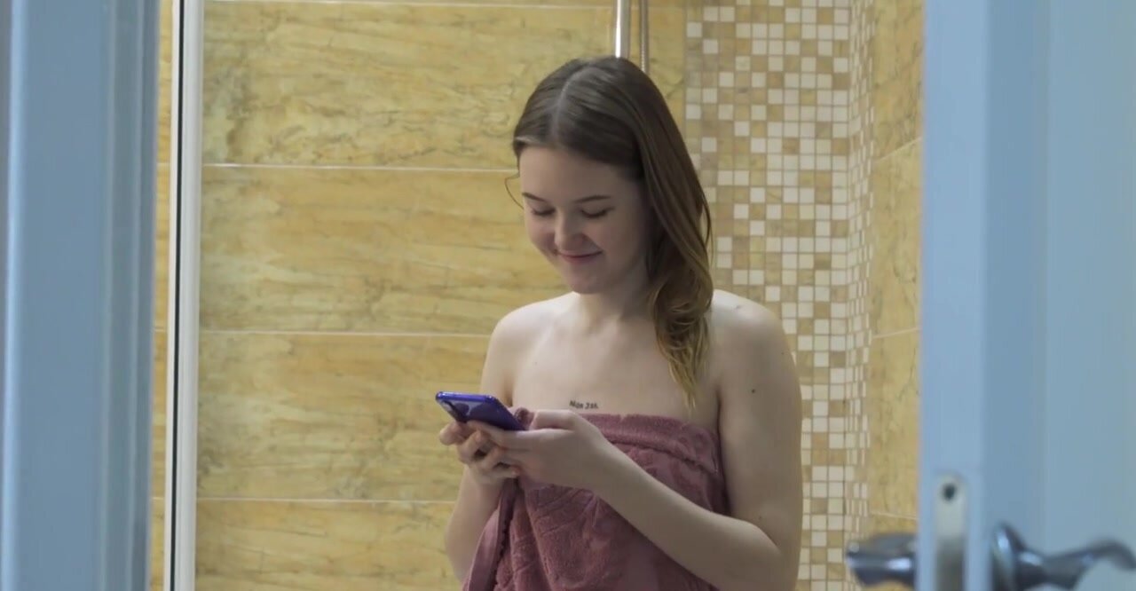 Getting wet in the shower before going for her man