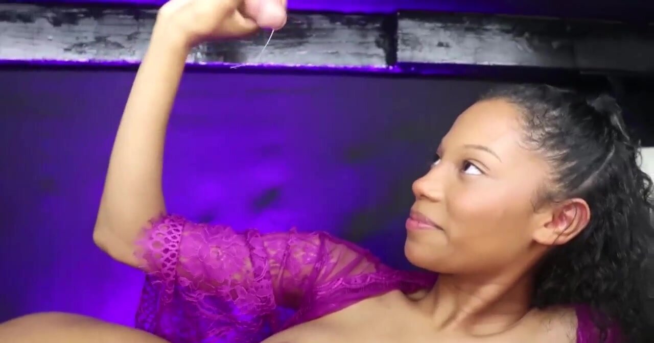 Skinny ebony girl Eden West is milking a large cock