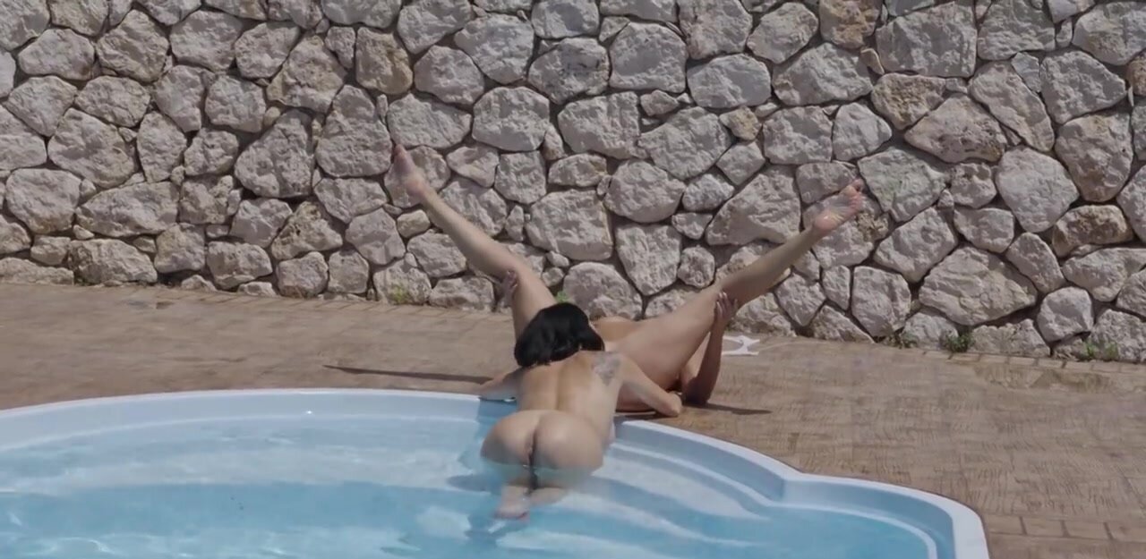 Two girls enjoying a poolside lesbian encounter in HD