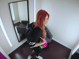 Redheaded beauty decides to masturbate in a public setting