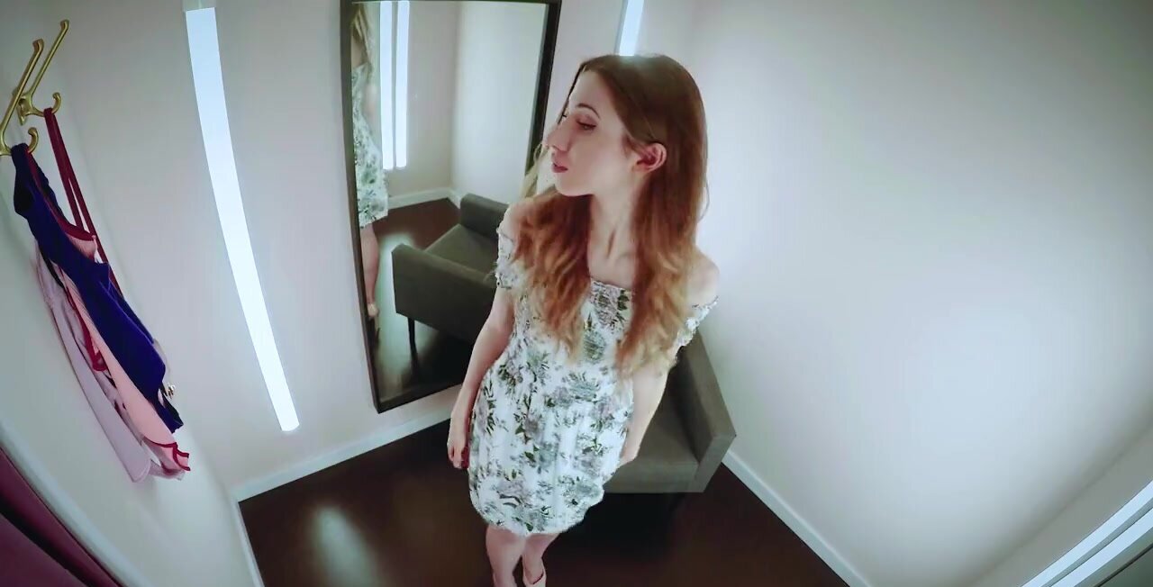 Fitting Room porn video – Good looking girl flashes a grin while teasing you