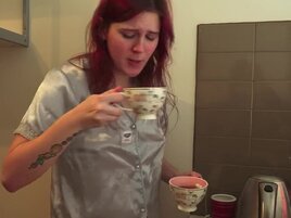 Redheaded girl is going to lick that brunette's pussy