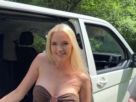 Hot girl with nice breasts getting in a public spot