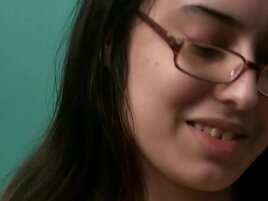 Solo girl in glasses playing with her hairy pussy