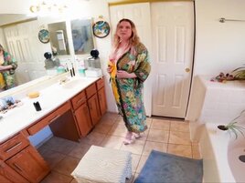 The blonde woman is on her knees and ready to suck