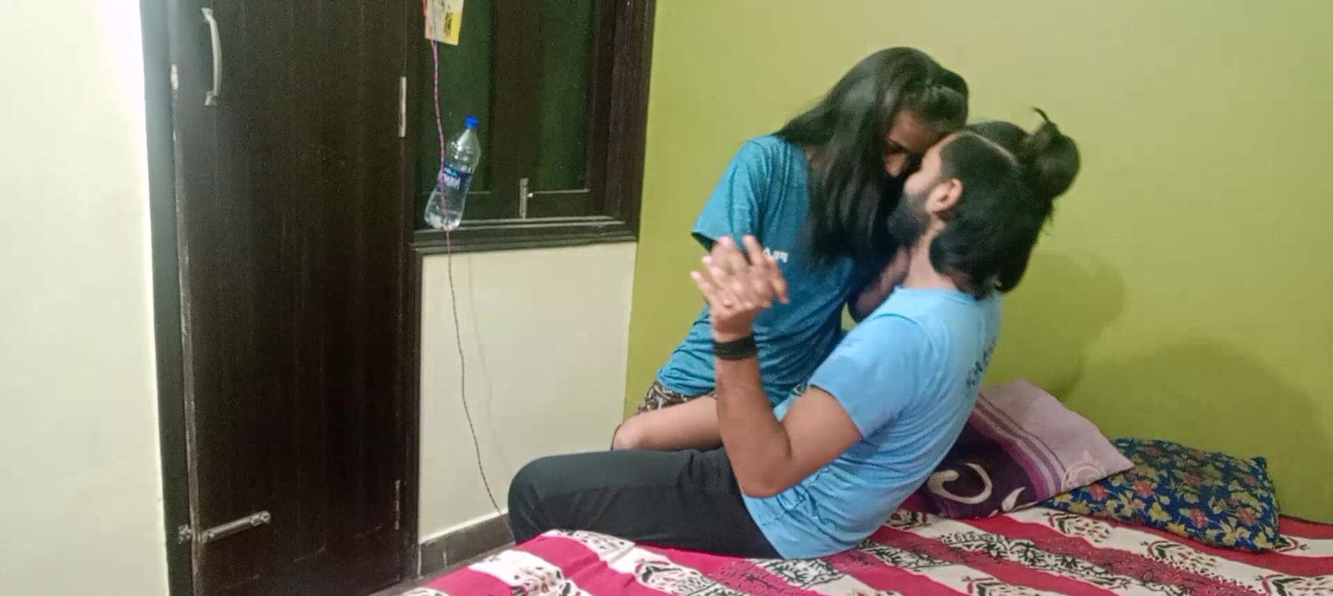 Man with long hair is having sex with a busty brunette