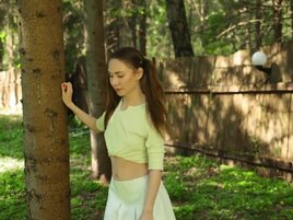 Pigtailed teen Nicole Heavens teasing her tight hole