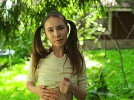 Pigtailed teen Nicole Heavens teasing her tight hole