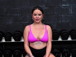 Brunette woman showing her ass while working out