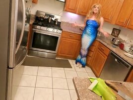 Busty blonde woman is fucked deep in the kitchen