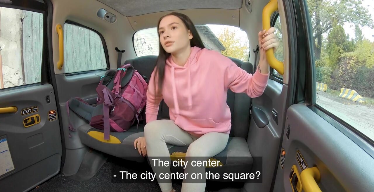 Petite brunette with a cute face is fucked in the taxi