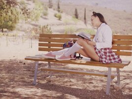 Brunette with cute spacebuns masturbates outdoors