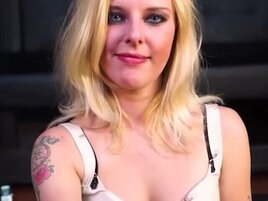 Trashy blonde with intense makeup gets fucked on all fours