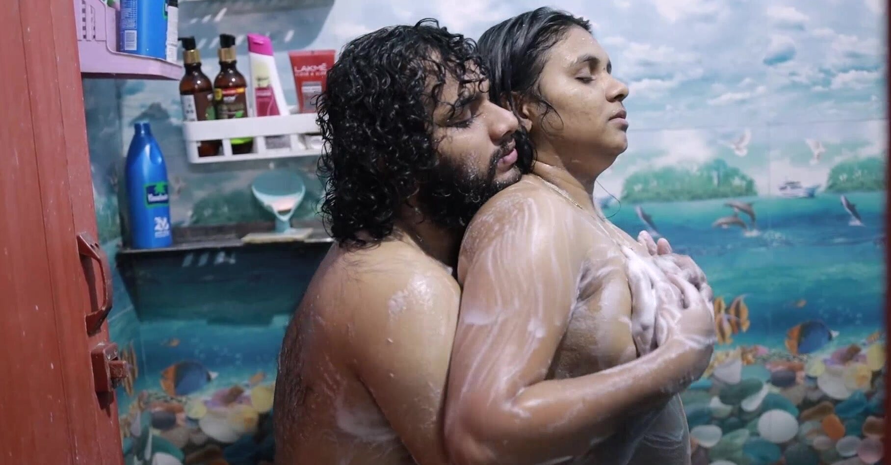 Chesty brunette getting wet in the shower with her man