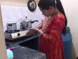 Horny Indian chick having sex with her man in the kitchen