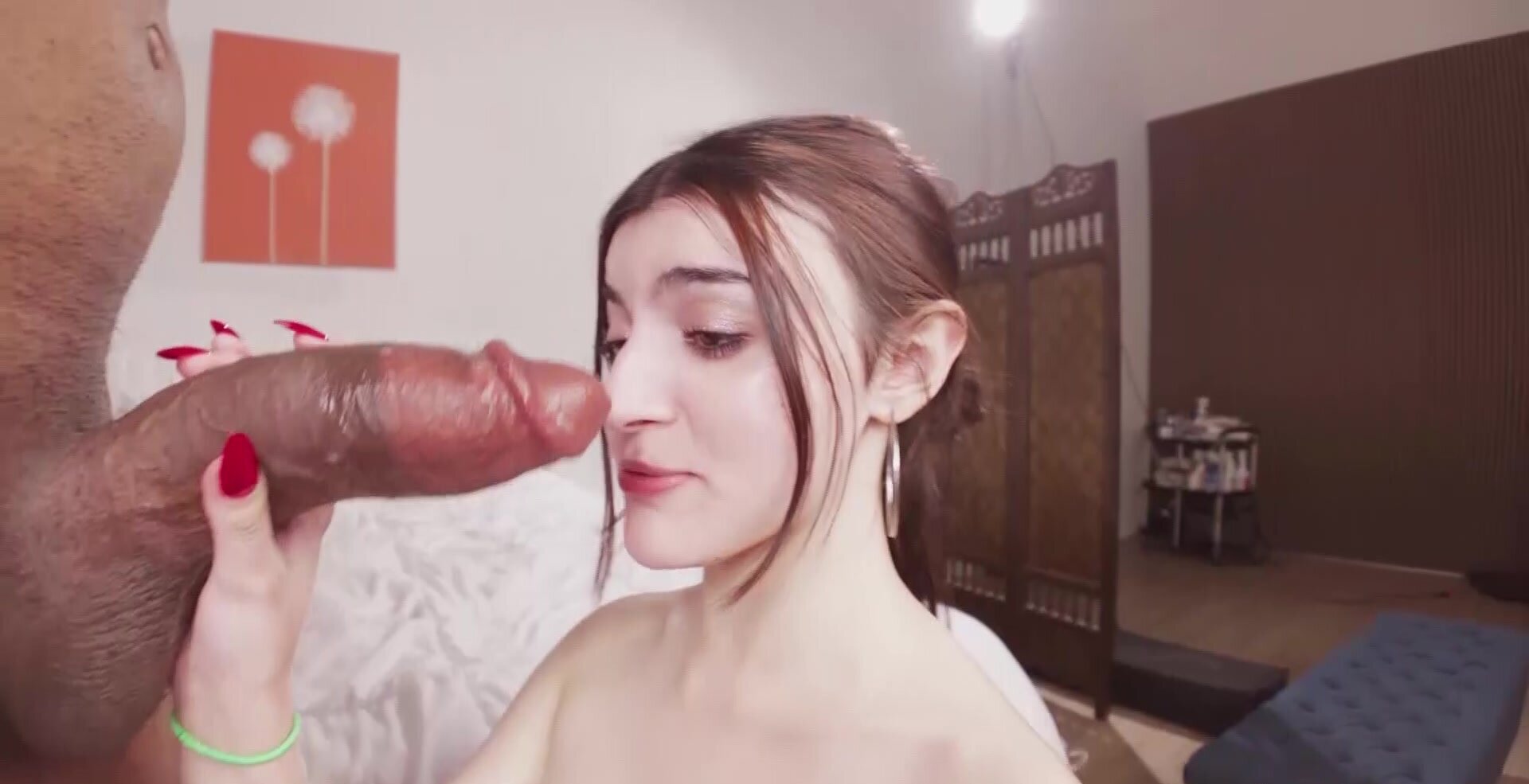 A big black cock is getting sucked by Julia James