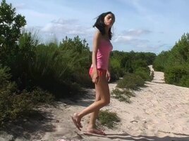 Asian girl shows her perfect ass while sunbathing