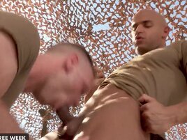 Soldiers are having sex in the desert in this one