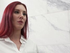 Redheaded beauty with huge tits gets fucked by a client