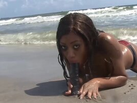 Jayda Foxx going on the beach to ride a  huge dildo