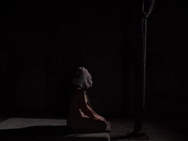 Blonde tested in a bondage room with suspension equipment
