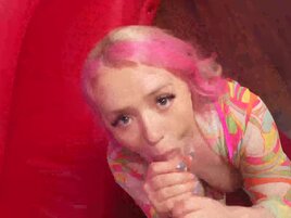 Pink hair hottie playing with her nips in a medical-themed scene