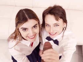 POV of two teen hotties sucking one massive cock