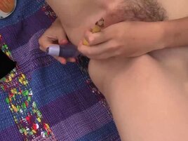 Redheaded slut Twila Moon toys with her hairy pussy